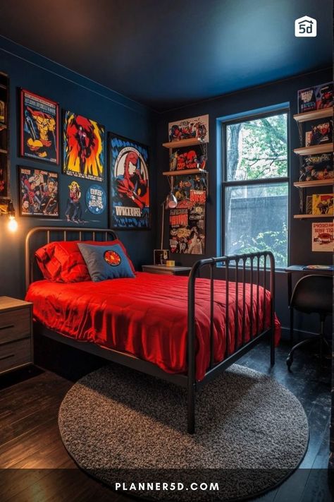 A comic-themed bedroom with dark blue walls, red bedding, and superhero wall art. Black And Red Boys Bedroom, Movie Themed Bedroom, Spider Man Room Ideas Kids, Red And Blue Boys Bedroom, Spider-man Room, Spiderman Themed Bedroom, Spiderman Room Ideas, Graphic Bedroom, Red Boys Bedroom