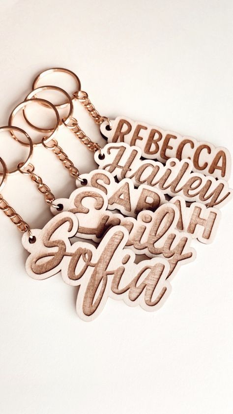 "Personalized Wooden Name Keychain  》These keychains are perfect for back packs, diaper bags, gym bags, etc. They also make a great and original gift for your loved ones and even as party favors!   》Each keychain is laser cut and engraved using 1/8\" solid wood and coated in lacquer.  》Each item is handmade to order, please allow 3-5 business days before it is shipped out. 》Please note due to the nature of the wood, each keychain is unique and may have slight differences.   HOW TO ORDER: 1. Select font style  2. Enter the name the way you want it to be printed. Case-sensitive. NOTE: Enter ONE name only. Please double check spelling before checking out.  IMPORTANT: 》We do not accept returns or exchanges for made to order products.  》These are made from sturdy basswood but can break if handl Wooden Name Keychain, Laser Engraving Coaster Ideas, Laser Engraved Clock, Laser Engraving Keychain, Metal Laser Engraving, Laser Engraving Business Names, Laser Engraving Ideas Projects Acrylic, Laser Pecker Projects, Disney Wood Projects