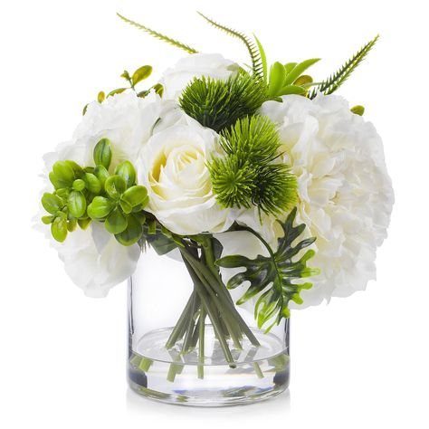 PRICES MAY VARY. 【Flower Type】 Mixed Artificial Silk Cream White Peony Flowers and Fake White Rose Flowers 【Product Size】Overall dimension of silk artificial peony rose bouquets with vase is approx 12H x 10W inches, The cylinder clear glass vase is approx 5H x 5W inches 【Unique Designs】Each rose and peonies bouquet arrangement in vase is handcrafted. The white faux peony flower is made of high-grade silk, the fake flower stem is wrapped in plastic wire, the clear glass vase is crafted with thick Peonies In Vase, Table Centerpieces Home, Dining Table Centerpieces, Rose Shrub, Peonies Centerpiece, Peony Colors, Fake Flower Arrangements, Peony Arrangement, White Floral Arrangements