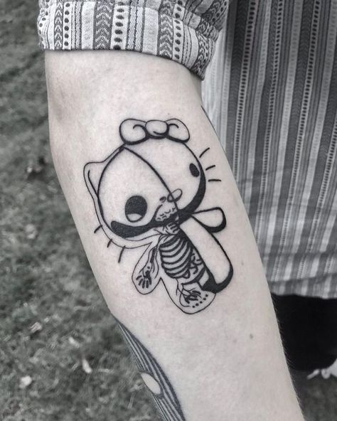 25 Kawaii Hello Kitty Tattoos That Kill With Centipede Tattoo Hello Kitty, Edgy Hello Kitty Tattoo, Hello Kitty Skull Tattoo, Dark Hello Kitty Tattoo, Creepy Hello Kitty Tattoo, Hello Kitty Skeleton Tattoo, Scary Hello Kitty Tattoo, Gothic Hello Kitty Tattoo, Hello Kitty Centipede Tattoo