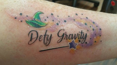 Defy Gravity tattoo. On my left inner forearm. Love it! Defy Gravity Tattoo, Gravity Tattoo, Wicked Tattoos, Inner Forearm, Tat Ideas, Leg Tattoos, Tattoo On, Infinity Tattoo, Body Art Tattoos