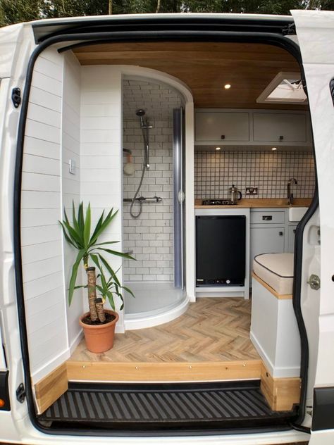 https://www.livinginashoebox.com/this-custom-built-campervan-makes-on-the-road-living-easy/ Quirky Campervan Interiors, Van Conversion Shower, Quirky Campers, Conversion Van, White Van, Bus Living, Kombi Home, Van Conversion Interior, Build A Camper Van