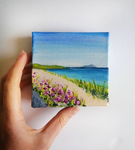 4x4 inch (10x10 cm) mini acrylic landscape of Scottish Beach Scene with pink floral detail.  Made in Scotland, UK.  This detailed original artwork is inspired by the beautiful landscapes of my home country, Scotland. Painted lovingly in acrylic on a mini 10x10 cm (4x4 inch) stretched box canvas, perfect to display in your living room, bedroom or hallway.  I will aim to post the painting within 1-3 business days. Delivery date will depend on destination location. ABOUT THE ARTIST: Hello! I'm Loui Scotland Art Painting, Mini Beach Paintings, Acrylic Beach Painting, Mini Acrylic Paintings, Acrylic Landscape Paintings, Art Mini Toile, Scottish Beach, Canvas Art Painting Abstract, Mini Toile