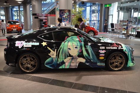 MIKU ITASHA(MODELLISTA) at TOYOYA car showroom Itasha Cars, Tokyo Trip, Toyota Car, Racing Car Design, Car Artwork, Car Goals, Car Showroom, Street Racing Cars, Car Mods