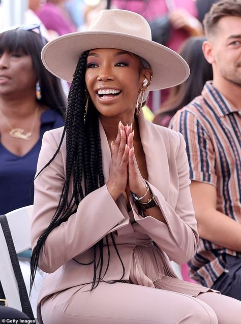 Fellow singer: Brandy Norwood, 43, chose a mauve suit with a belted jacket and matching mauve fedora to support her friend, who cut the record In These Streets Outfits With Fedora Hats, Mauve Suit, Outfit With Fedora, L Shaped Couches, Fedora Outfit, Fedora Hat Outfits, Types Of Hats For Women, Brandy Norwood, Coral Outfit