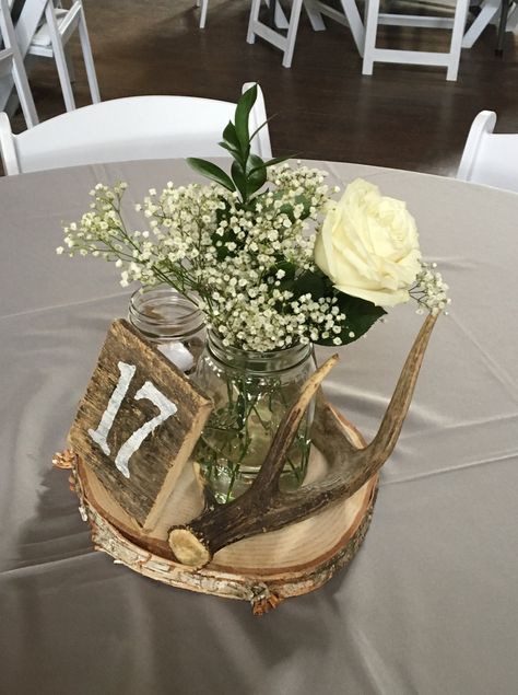 Antler Centerpiece Wedding, Antler Wedding Centerpieces, Antler Wedding Decor, Green And Burgundy Wedding, Country Wedding Centerpieces, Cowboy Themed Birthday Party, Shed Wedding, Wedding Centerpieces Mason Jars, Country Western Wedding