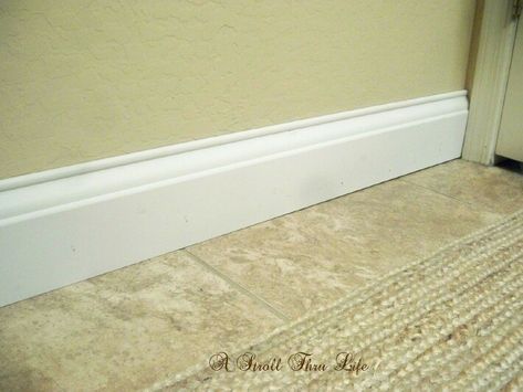 A little update goes a long way. Small Bathroom Upgrades, Bathroom Baseboard, Faux Brick Accent Wall, Faux Brick Wallpaper, Baseboard Styles, Floor Moulding, Brick Accent Wall, Baseboard Trim, Trim Ideas