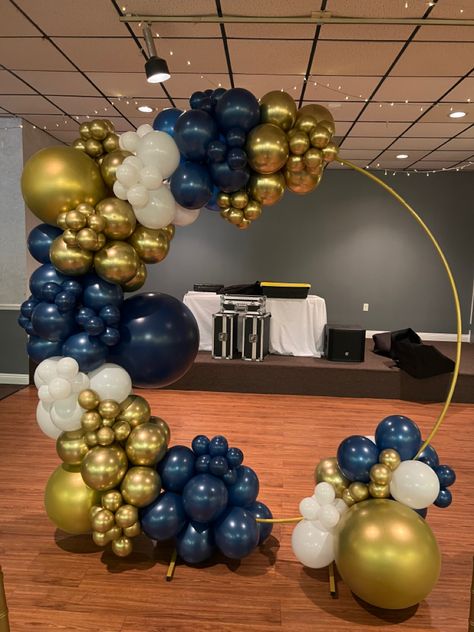 Navy and gold wedding balloon backdrop Balloon Decorations Blue And Gold, 21st Birthday And Graduation Party, Navy And Gold Balloon Decor, Blue And Gold Backdrop Party Ideas, Navy Blue And Gold Balloon Arch, Navy Blue Gold Party Decorations, Navy Blue And Gold Party Theme, Navy And Gold Event Decor, Dark Blue And Gold Balloons