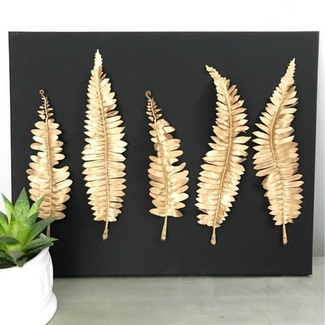 How to create your own metal leaf wall art at a fraction of the cost. A project inspired by the metal leaf home decor at Target. Metal Leaf Wall Art, Do It Yourself Decoration, Diy Sunglasses, Face Ideas, Painting Face, Sunglasses Storage, Dollar Store Diy Projects, Festival Essentials, Inexpensive Home Decor