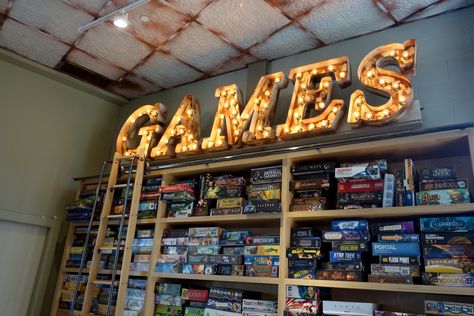 Where to get your family game on, plus a 101 on the hottest board games and trading card games Board Game Bar, Board Game Collection, Board Game Store, Board Game Room, Board Game Cafe, Florida Mansion, Game Cafe, Board Game Storage, Party Card Games