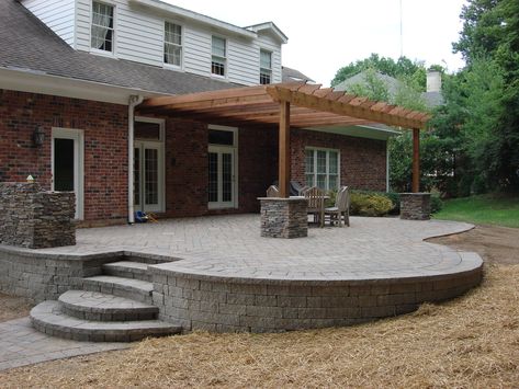 Landscaping Stairs Sloped Yard Diy, Interlock Around Pool, Concrete Patio On Sloped Yard, Sloped Backyard Patio, Raised Concrete Patio Ideas, Raised Paver Patio, Tiered Patio, Concrete Patio Designs, Raised Patio