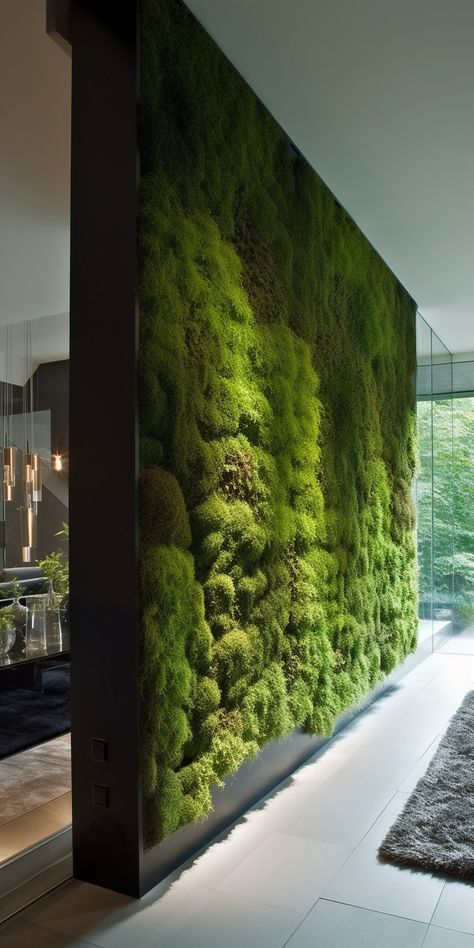 An elegant moss wall room divider, uniting the beauty of nature and contemporary design to create a serene, functional partition in an indoor space. Office Living Wall, Green Moss Wall, Green Wall Partition, Fake Living Wall, Room With Lots Of Plants, Plant Room Divider, Moss Ceiling, Green Divider, Live Moss Wall