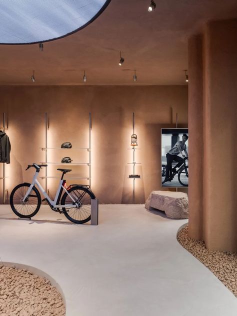 Ciguë imagines car-free city inside Cowboy's electric bike shop in Paris Electric Bicycle Design, Bicycle Room, Shop In Paris, Paris Interiors, Cycle Store, Concrete Walkway, Bicycle Store, Paris Store, Electric Bike Conversion