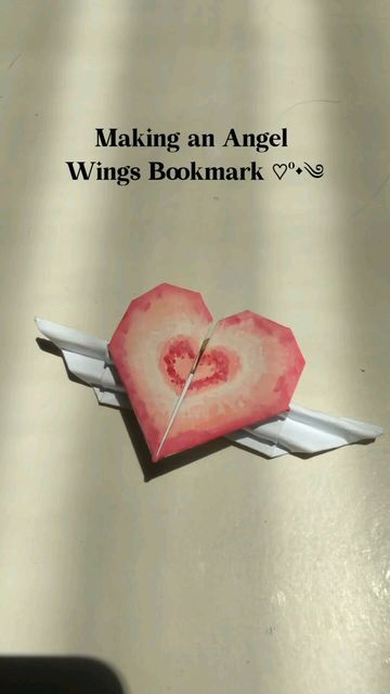 SAFIRA on Instagram: "an Angel Wings Bookmark ♡ #reels #bookmark #bookstagram #instagood" Origami Tutorials, Origami Bookmark, Diy Crafts For Teens, Heart Bookmark, Pinterest Diy Crafts, Paper Craft Diy Projects, Diy Bookmarks, Beautiful Angel, Origami Crafts Diy