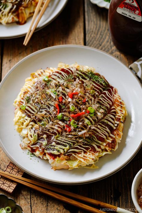 Okonomiyaki is a savory Japanese cabbage pancake “grilled as you like it“ with your choice of protein and tasty condiments and toppings. My recipe for this popular Osaka street food includes the 6 key ingredients that give it a truly authentic taste. Japanese Ginger Dressing, Japanese Cabbage, Osaka Street, Okonomiyaki Recipe, Just One Cookbook, Japanese Ginger, Ginger Pork, Japanese Soup, Grated Potato