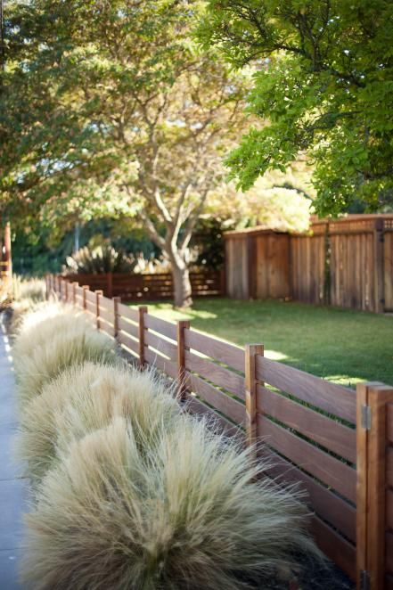 HGTV Magazine took a spin through neighborhoods all around the U.S. and found eye-catching houses worth a closer look. Gard Modern, Pagar Modern, Short Fence, Wood Fence Design, Hgtv Garden, Front Fence, Desain Lanskap, Fence Styles, Front Yard Fence