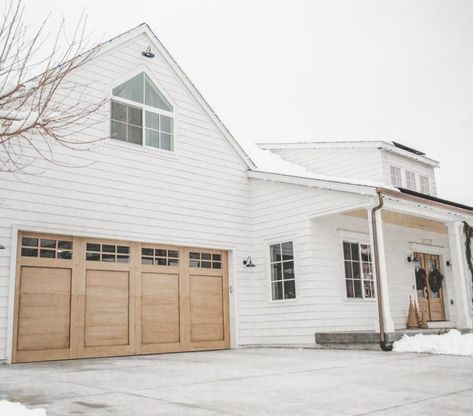 cb28 White House With Cedar Garage Doors, Oversized Garage Doors, White House Garage Doors, White House With Wood Garage Doors, White House Wood Garage Door, Garage Doors On White House, Wood Garage Doors White House, Garage Doors White House, Wood Look Garage Doors