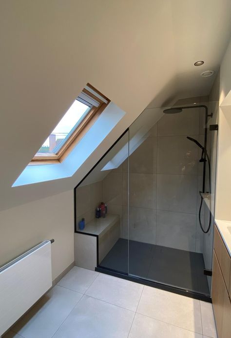 Attic Conversion Bathroom, Bath Under Velux Window, Slanted Ceiling Ensuite, Angle Ceiling Bathroom, Dormer Shower Ideas, Shower Under Sloping Roof, Sloped Roof Bathroom, Small Bathroom Ideas Sloped Ceiling, Bathroom Mansard