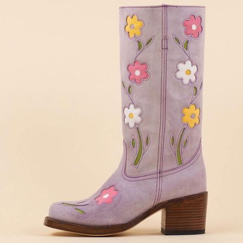 Elevate your style with these vintage lavender cowgirl boots featuring intricate floral designs. The mid-calf height and sturdy block heel offer both fashion-forward flair and comfortable wear for any occasion. Color: Lavender Heel Type: Block heel Heel Height: 2.36" / 60 mm approx Shaft Height: 11.81'' / 300 mm approx Product measurements were taken using size 8. Please note that measurements may vary by size. Toe: Square toe Flower blossom design Pull-on design Handcrafted US sizing. Fits ... Purple Cowboy Boots, Lavender Heels, Retro Boots, Flower Boots, Vintage Lavender, Funky Shoes, Lavender Flower, Purple Tulips, Blossom Design