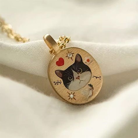 Want to keep your beloved pets as your precious memory? Or want to have a unique gifts on special occasion?  Important Note: Buy With Confidence This is our highest quality jewelry series. There is a year period for warranty, if the necklace color getting fade within the warranty period, or the chain breaks, or the enamel pattern of pet or other decorations on the charm getting fade, please send back us, we can do the free repair for you. Kindly feel free to contact with us.Thank you. This is our gorgeous enamel necklace with photo, design idea is depending on your requirements, we are aim to make your dream necklace for your beloved pet or beloved person as precious memory. Fully Hand Painting as per your own photo color.  Material The sterling silver and 9K solid gold ,14K solid gold , 1 Pet Jewelry, Pet Keepsake Ideas, Pet Memorial Ideas, Vintage Jewelry With Cat Design For Gift, Cat Memorial Jewelry, Custom Cat Necklace, Gold Cat Design Charm Necklace As Gift, Cat Design Pendant Charm Necklaces For Gift, Portrait Necklace