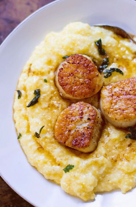 Quickly seared scallops with italian herb brown butter sauce. Topped over creamy polenta. Recipe on www.thegourmetgourmand.com Polenta And Scallops, Scallop Recipes With Rice, Scallops And Polenta Recipe, Scallops With Polenta, Scallops Meal, Steamed Scallops, Polenta Dishes, Brown Butter Scallops, Scallop Dinner