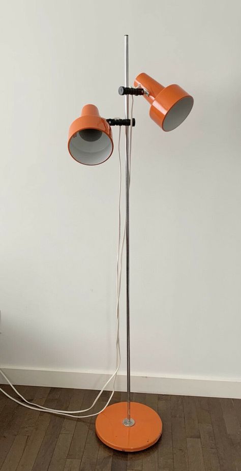 Vintage Mid Century Modern 2 Head Metal Floor Lamp Orange Adjustable Spot Light See the listing >>> https://everythingmcm.com/vintage-mid-century-modern-2-head-metal-floor-lamp-orange-adjustable-spot-light/ Floor Lamp 70s, Retro Floor Lamp Mid Century, Funky Standing Lamp, Mid Century Lamps Floor, Orange Floor Lamp, 70s Floor Lamp, Mcm Floor Lamp, Floor Lamp Living Room Ideas, Lamp Living Room Ideas