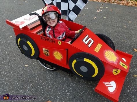 Allyson: Sam is a huge fan of Formula 1 car racing and of Sebastian Vettel, he was lucky enough to meet Sebastian as part of his Make-a-Wish and insisted on being... Wagon Race Car Costume, Cardboard Formula 1 Car, Kindy 500 Cars, Diy Car Costume, Car Halloween Costumes, Race Car Halloween Costume, Formula 1 Costume, Formula 1 Halloween Costume, Kindy 500