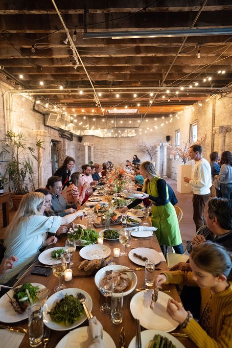 Long Table Restaurant, Long Table Dinner Party Indoor, Warehouse Dinner Party, Family Style Reception Dinner, Wedding Food Family Style, Family Restaurant Aesthetic, Long Table Dinner Party, Family Style Dinner Table, Family Style Dinner Wedding