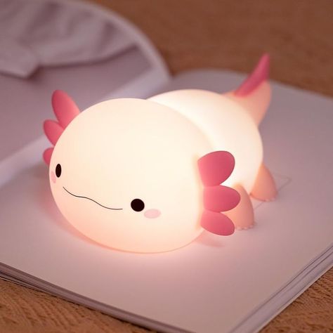 ✨ Looking for the perfect adorable night light for your little one's room? 🌙 Meet the Pink Axolotl Night Light – a soft silicone friend that brings a magical glow to any nursery or bedroom! 🌸 This rechargeable touch lamp is easy to use and adds a soothing ambiance, making it a must-have for toddlers and kids alike. 🦕 Whether it's a gift for a baby shower, birthday, or just because, this cuddly creature will bring smiles. 🎁💖 #NurseryDecor #AxolotlLove #GiftIdeasForGirls #SoftGlow Animal Lights, Animal Light, Cute Lamp, Cute Axolotl, Led Night Lamp, Kids Night, Light Eyes, Touch Lamp, Dim Lighting