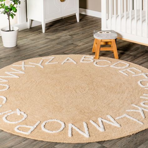 This round alphabet area rug is the perfect finishing touch to your child’s nursery or playroom. Nursery Rugs Neutral, Alphabet Rug, Winnie The Pooh Nursery, Nursery Rug, Nursery Rugs, Boho Nursery, Washable Rug, Neutral Rugs, Machine Washable Rugs