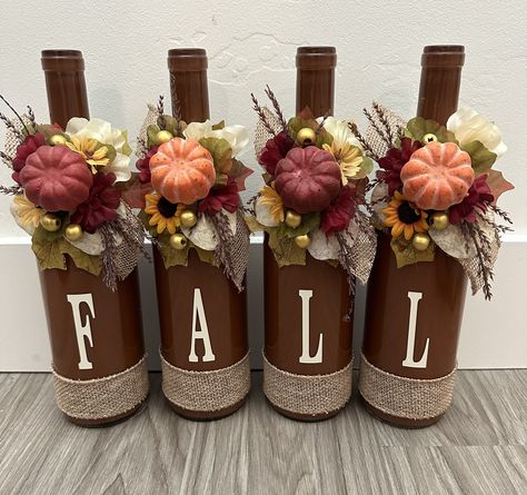 Add a touch of fall to your home!! Custom wine bottle home decor sets made to order. They make the perfect gift and home decorative accent.  We offer custom sets to match your home decor theme, please send us a message and we would be happy to create a beautiful piece for you or that special someone. Fall Craft Projects Home Decor, Red Wine Bottle Crafts, Wine Bottle Crafts For Fall, Natural Thanksgiving Decor, Fall Bottle Crafts, Wine Glass Fall Crafts, Thanksgiving Wine Bottle Crafts, Fall Wine Bottle Decor, Fall Wine Bottle Crafts