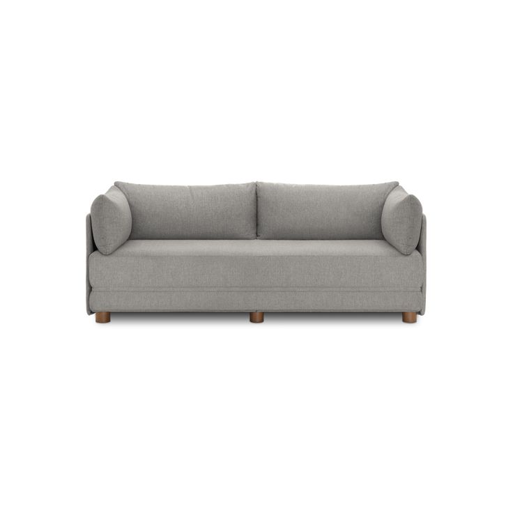 a gray couch with wooden legs on a white background