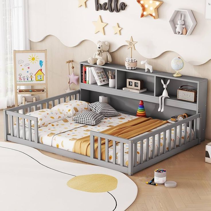 a child's bedroom with a bed, bookcase and toys