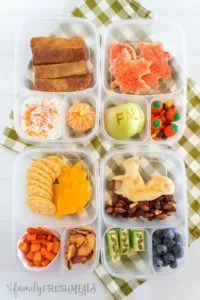 a plastic container filled with lots of food