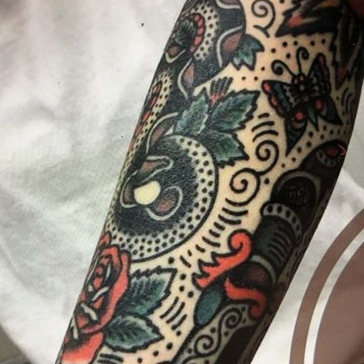 a person with a tattoo on their arm