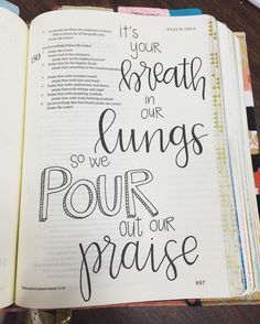 an open bible with the words, it's your breath in our lungs so we pour out our praise