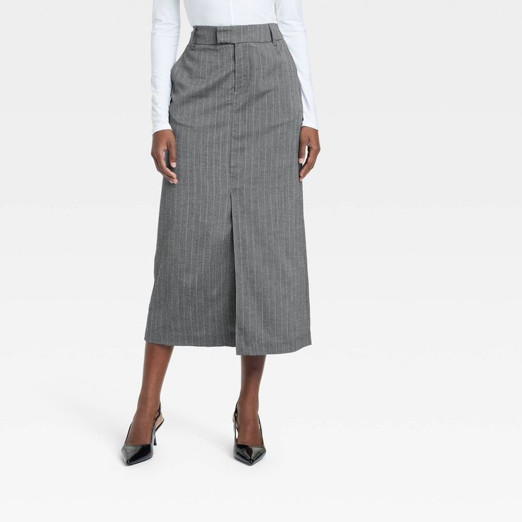 Move through your busy day in confident style in these Tailored Midi Skirt from A New Day™. Fashioned in a midi length, this mid-rise skirt made from midweight fabric with added stretch make a comfy addition to your wardrobe. It's designed with a fly zipper with back elastic for a secure fit and customizable wear. Boasting classic pinstripe pattern in gray, it pairs well with a wide range of tops for versatile styling. A New Day™: Style that goes wherever you do.