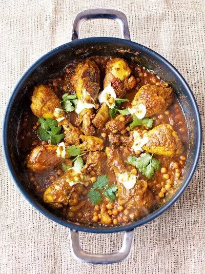 a pan filled with food sitting on top of a table