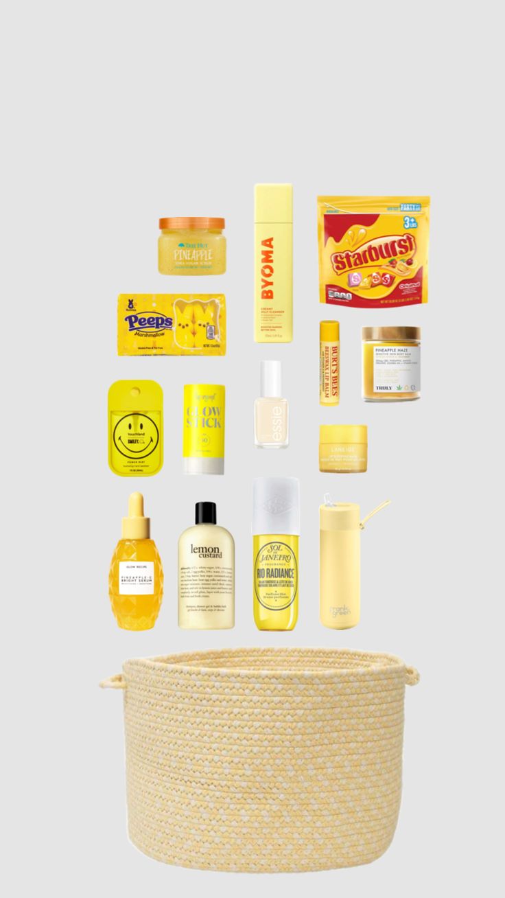 a basket filled with different types of cosmetics and skin care products on top of a gray background