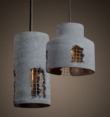 two concrete lamps hanging from the ceiling