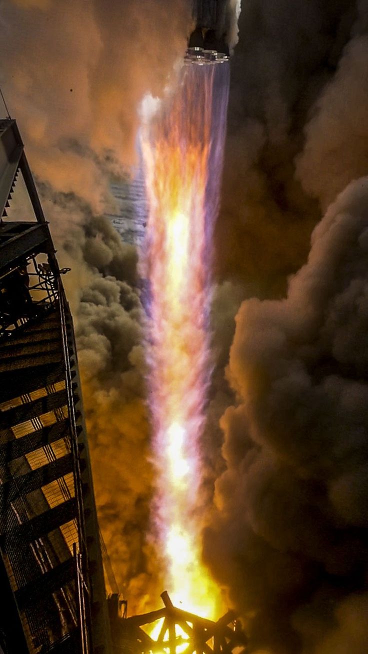 a large rocket is being launched into the sky