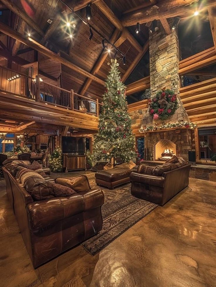 a living room with couches and a christmas tree in the middle of the room