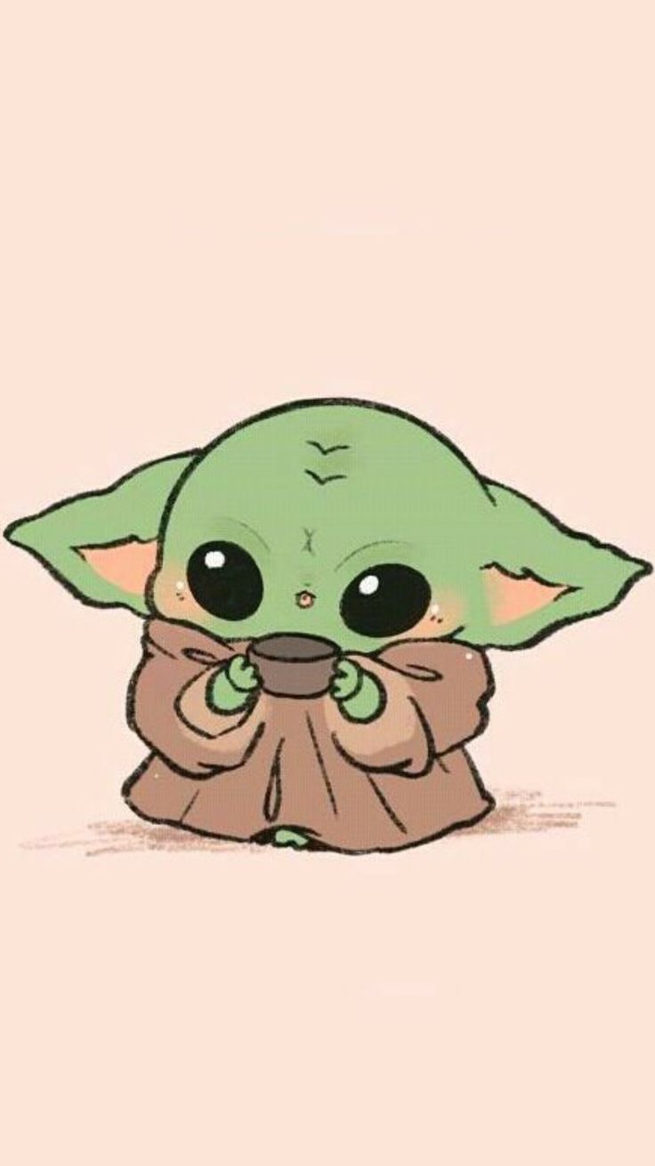 the baby yoda is holding something in its hands and looking at it's face