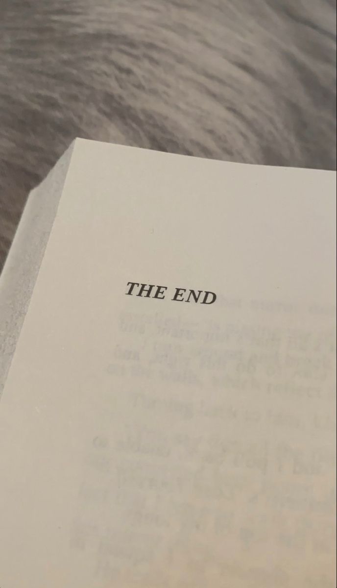 an open book with the word the end written on it