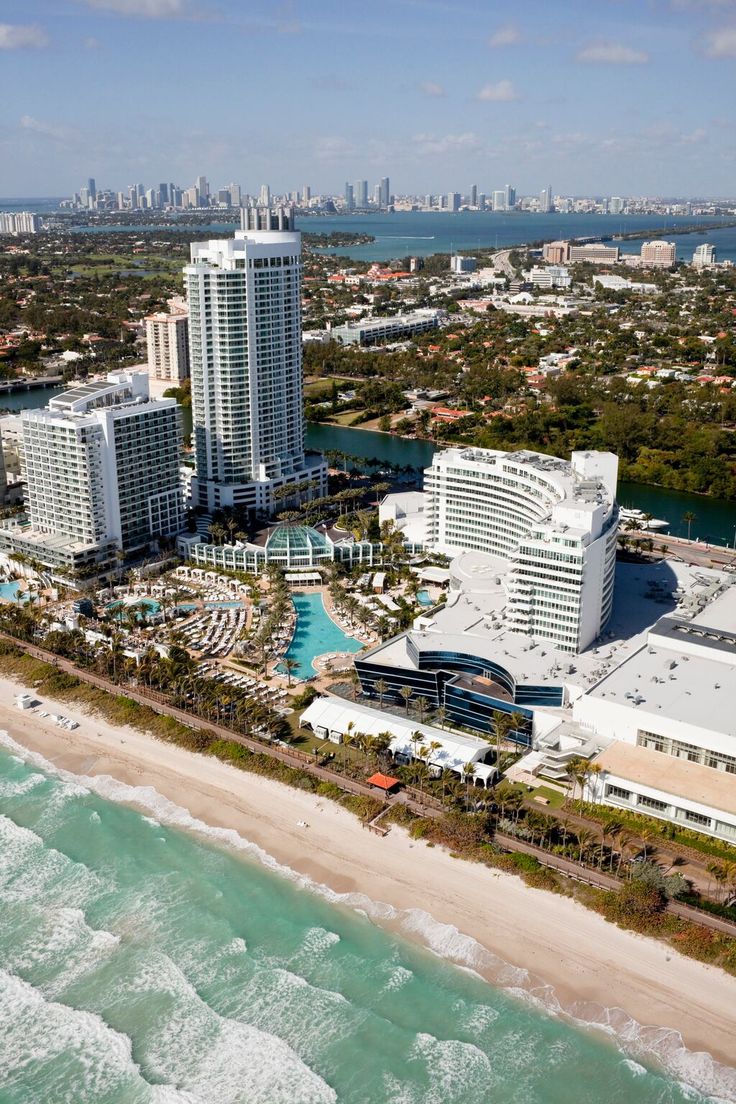 an aerial view of the beach and hotels in miami