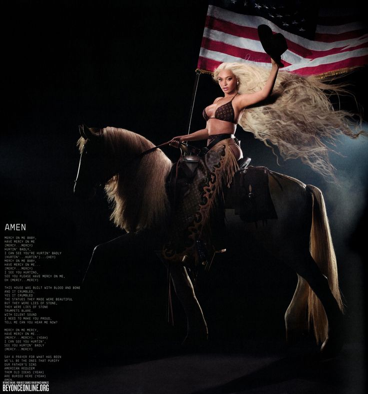 a woman riding on the back of a horse with an american flag in the background