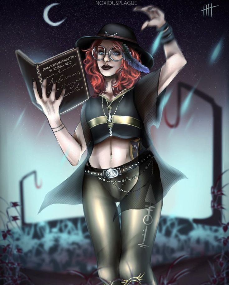 a woman dressed as a witch holding a book