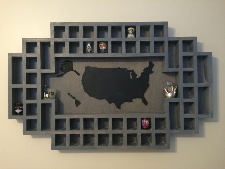 a map made out of cinder blocks on the wall