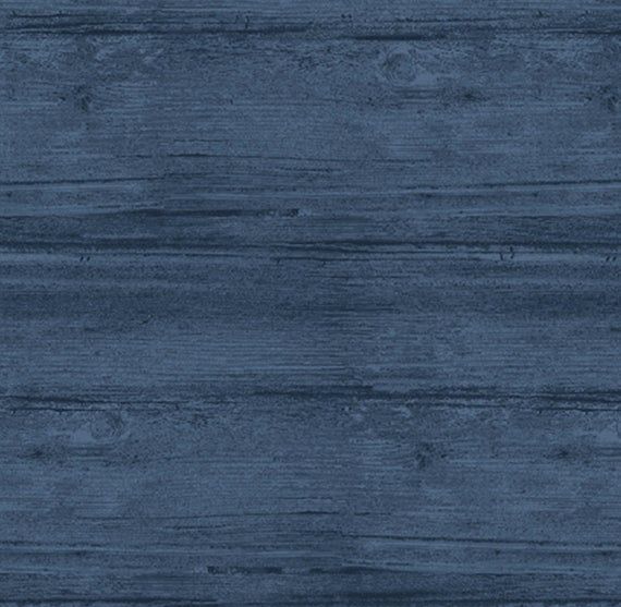 a dark blue wood textured background that looks like it has been painted in different shades