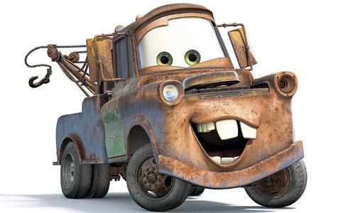 the character mater from cars is smiling